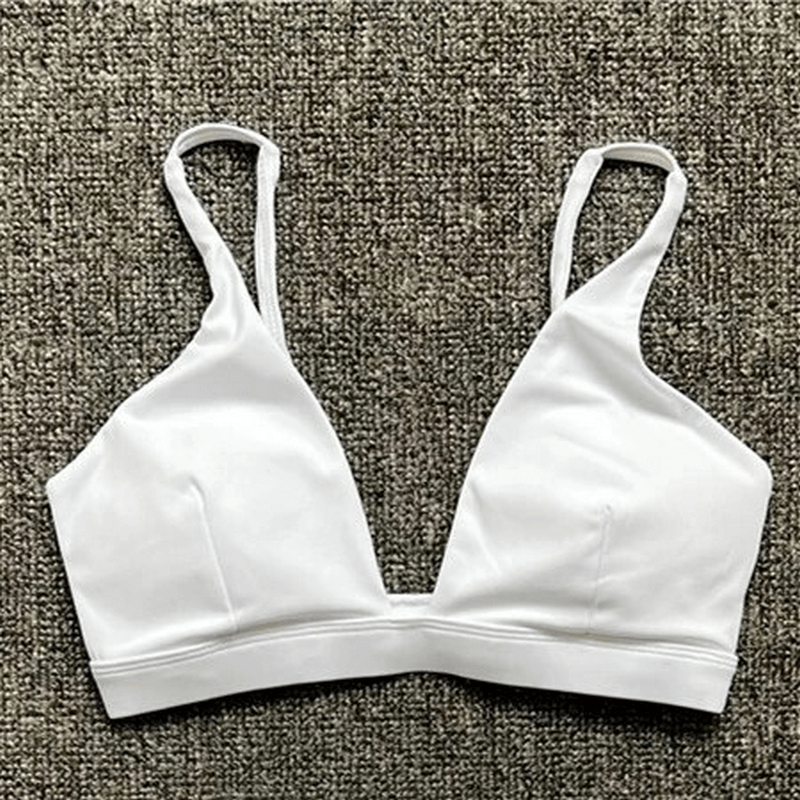 White women's quick-drying nylon sports bra with deep neckline, ideal for yoga and active pursuits, SF1758.